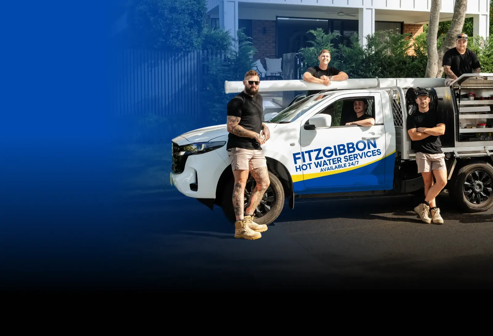 Fitzgibbon Hot Water Services team with the ute
